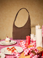 The Midi Arc slouchy hobo bag in chocolate brown nylon for work, travel and everyday use