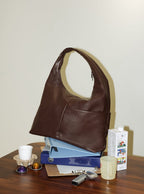 The Arc slouchy hobo-style bag in dark reddish brown matte vegan leather for work and office essentials
