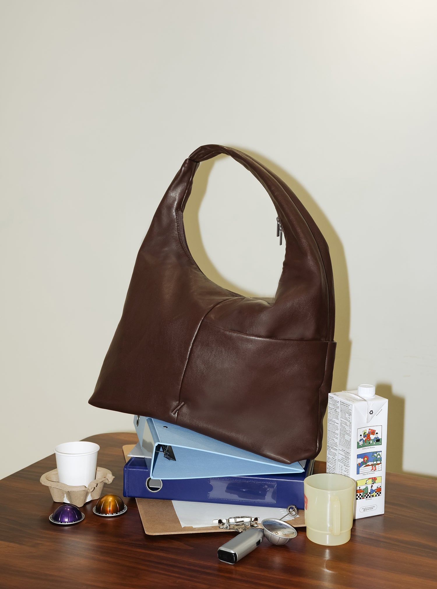 The Arc slouchy hobo-style bag in dark reddish brown matte vegan leather for work and office essentials