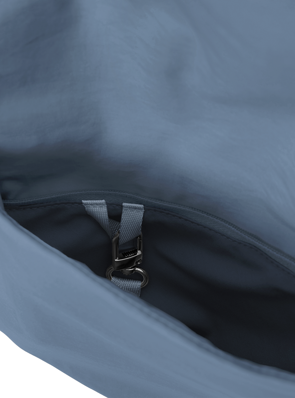 Exterior pocket of the Arc hobo-style bag in grey blue nylon, with concealed snap loop