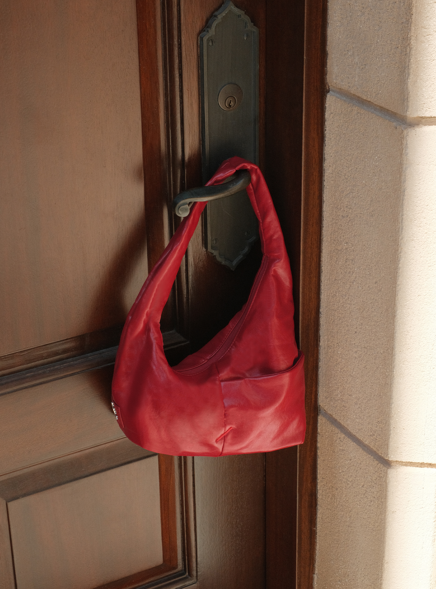 The Mini Arc slouchy hobo-style shoulder bag in red vegan leather for errands, weekends and everyday use