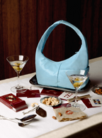 The Mini Arc slouchy hobo-style shoulder bag in pale blue vegan leather for errands, weekends and everyday use