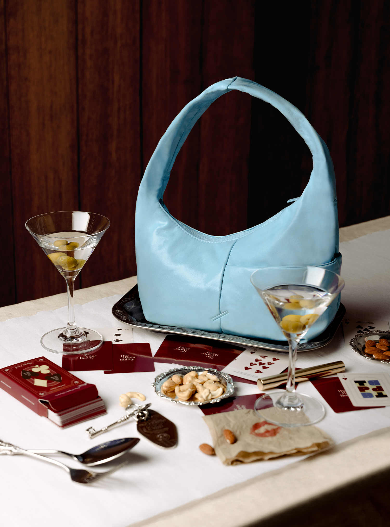 The Mini Arc slouchy hobo-style shoulder bag in pale blue vegan leather for errands, weekends and everyday use