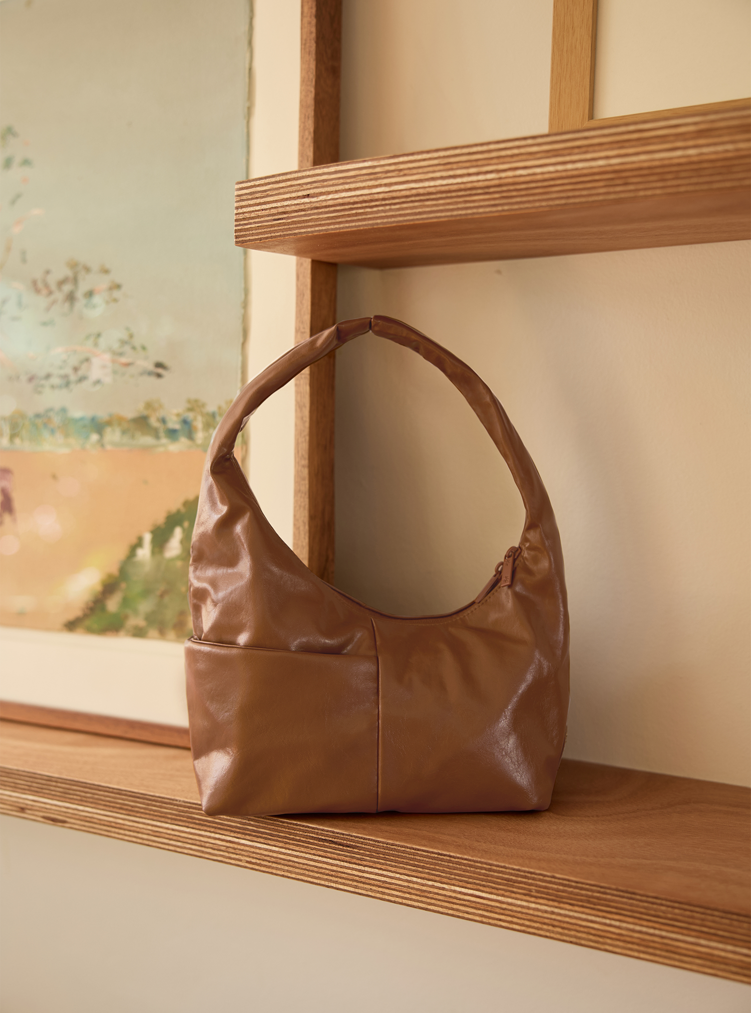 The Mini Arc slouchy hobo-style shoulder bag in warm brown vegan leather for errands, weekends and everyday use