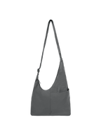 The Midi Arc slouchy hobo bag in dark grey nylon with adjustable strap for shoulder or crossbody wear