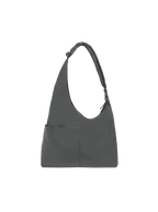The Midi Arc slouchy hobo-style bag in dark grey nylon with exterior pockets