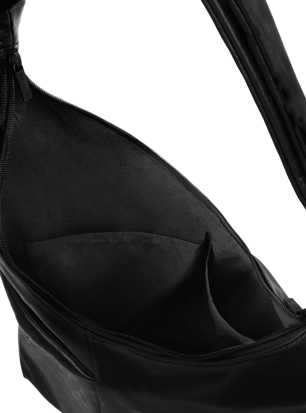 Interior of the Midi Arc hobo-style bag in matte black vegan leather, with multiple pockets