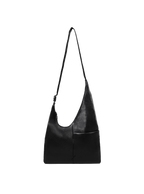 The Midi Arc slouchy hobo bag in matte black vegan leather with adjustable strap for shoulder or crossbody wear