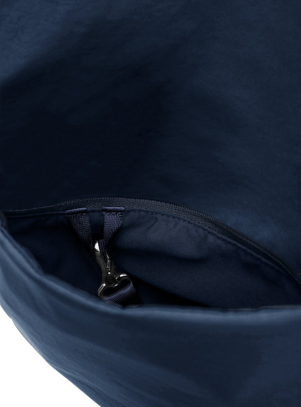 Exterior pocket of the Midi Arc hobo-style bag in navy nylon, with concealed snap loop