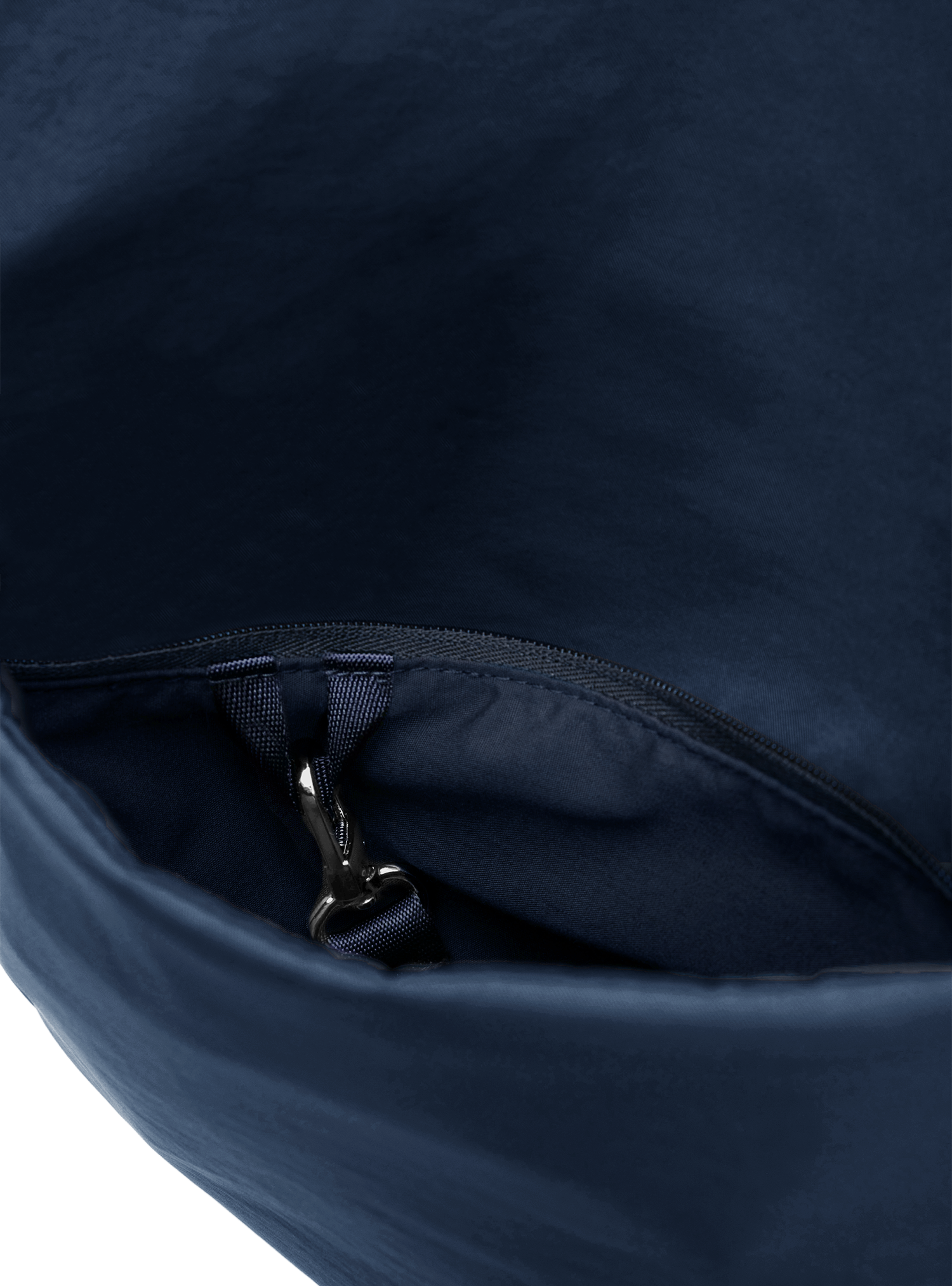 Exterior pocket of the Midi Arc hobo-style bag in navy nylon, with concealed snap loop