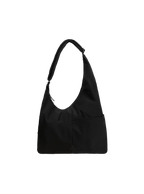 The Midi Arc slouchy hobo-style bag in black nylon with adjustable shoulder strap