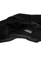 Interior of the Midi Arc hobo-style bag in black nylon, with multiple pockets and a bottle holder