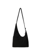 The Midi Arc slouchy hobo bag in black nylon with adjustable strap for shoulder or crossbody wear