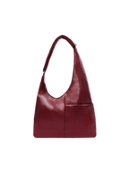The Midi Arc slouchy hobo-style bag in wine red vegan leather with adjustable shoulder strap