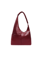 The Midi Arc slouchy hobo-style bag in wine red vegan leather with exterior pockets