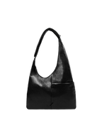 The Midi Arc slouchy hobo-style bag in black vegan leather with adjustable shoulder strap