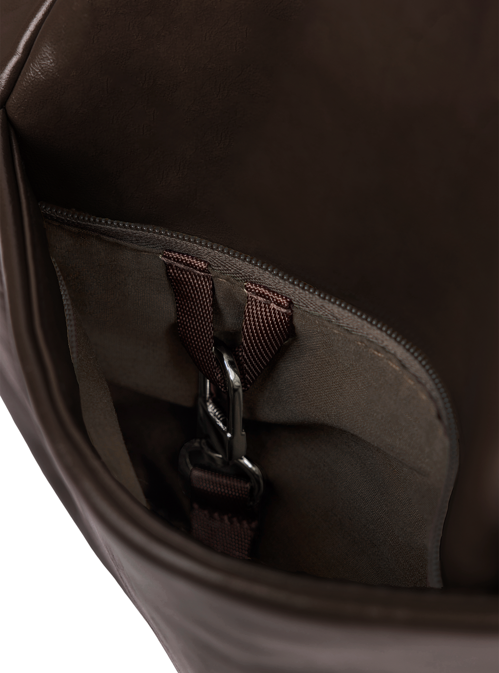 Exterior pocket of the Midi Arc hobo-style bag in dark brown vegan leather, with concealed snap loop