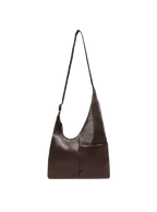 The Midi Arc slouchy hobo bag in dark brown vegan leather with adjustable strap for shoulder or crossbody wear