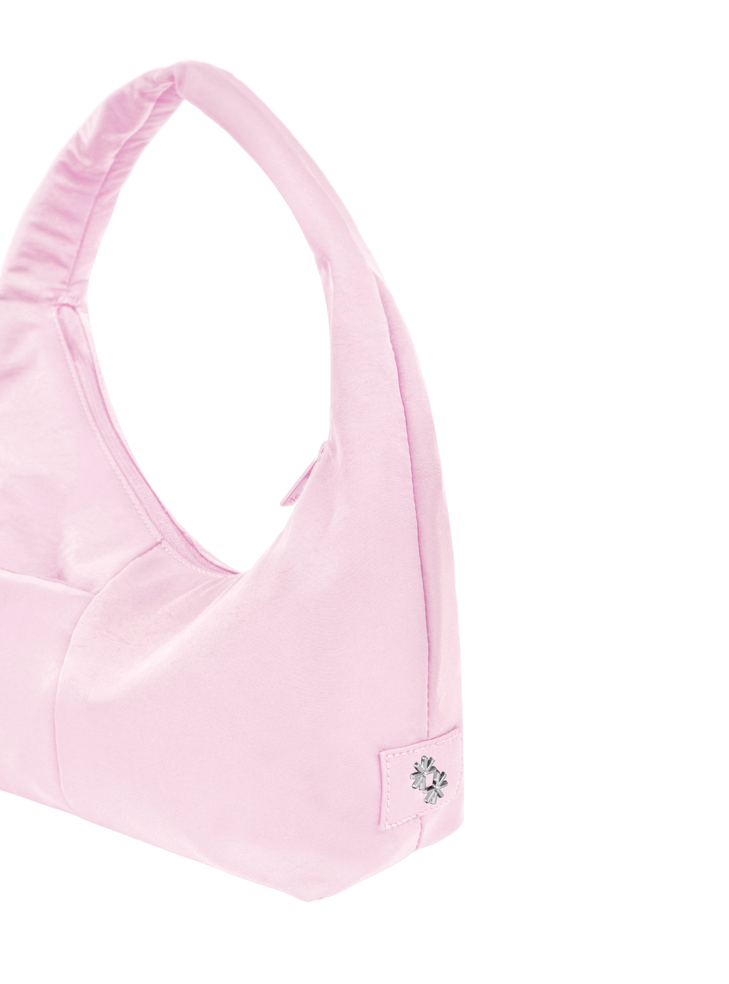 Close-up of the Mini Arc hobo-style shoulder bag in light pink nylon, showing metal logo emblem