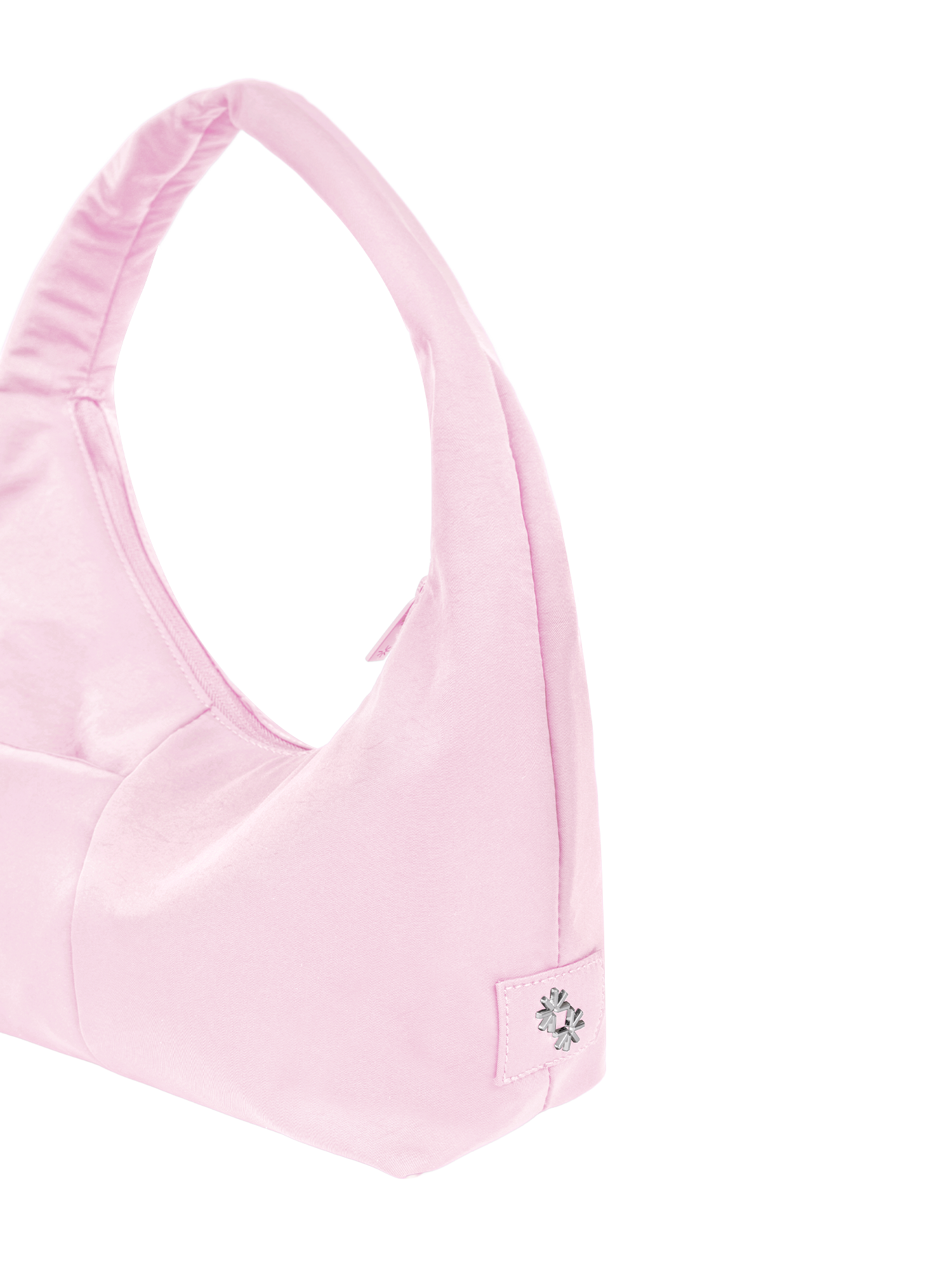 Close-up of the Mini Arc hobo-style shoulder bag in light pink nylon, showing metal logo emblem