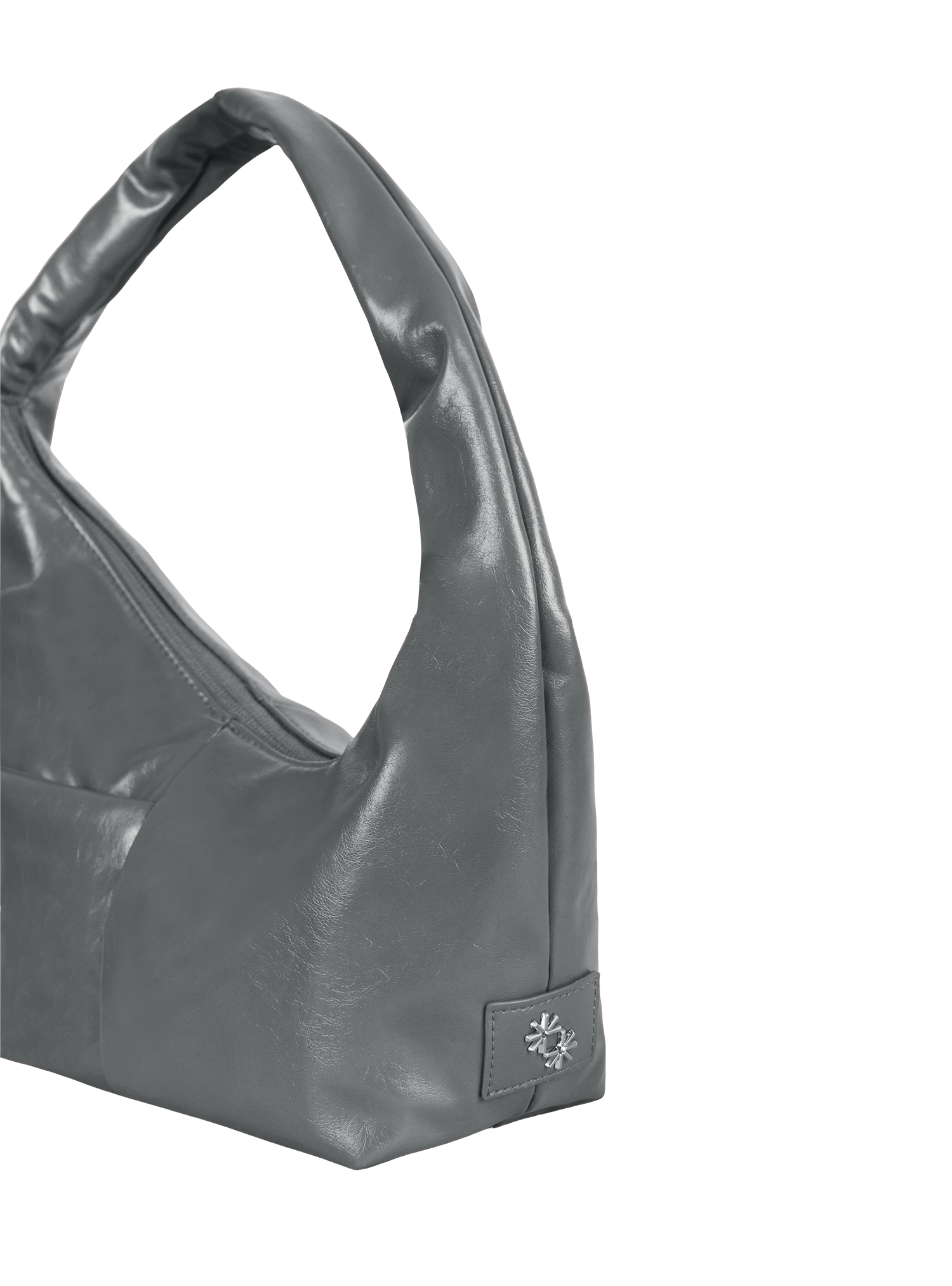 Close-up of the Mini Arc hobo-style shoulder bag in deep grey vegan leather, showing metal logo emblem