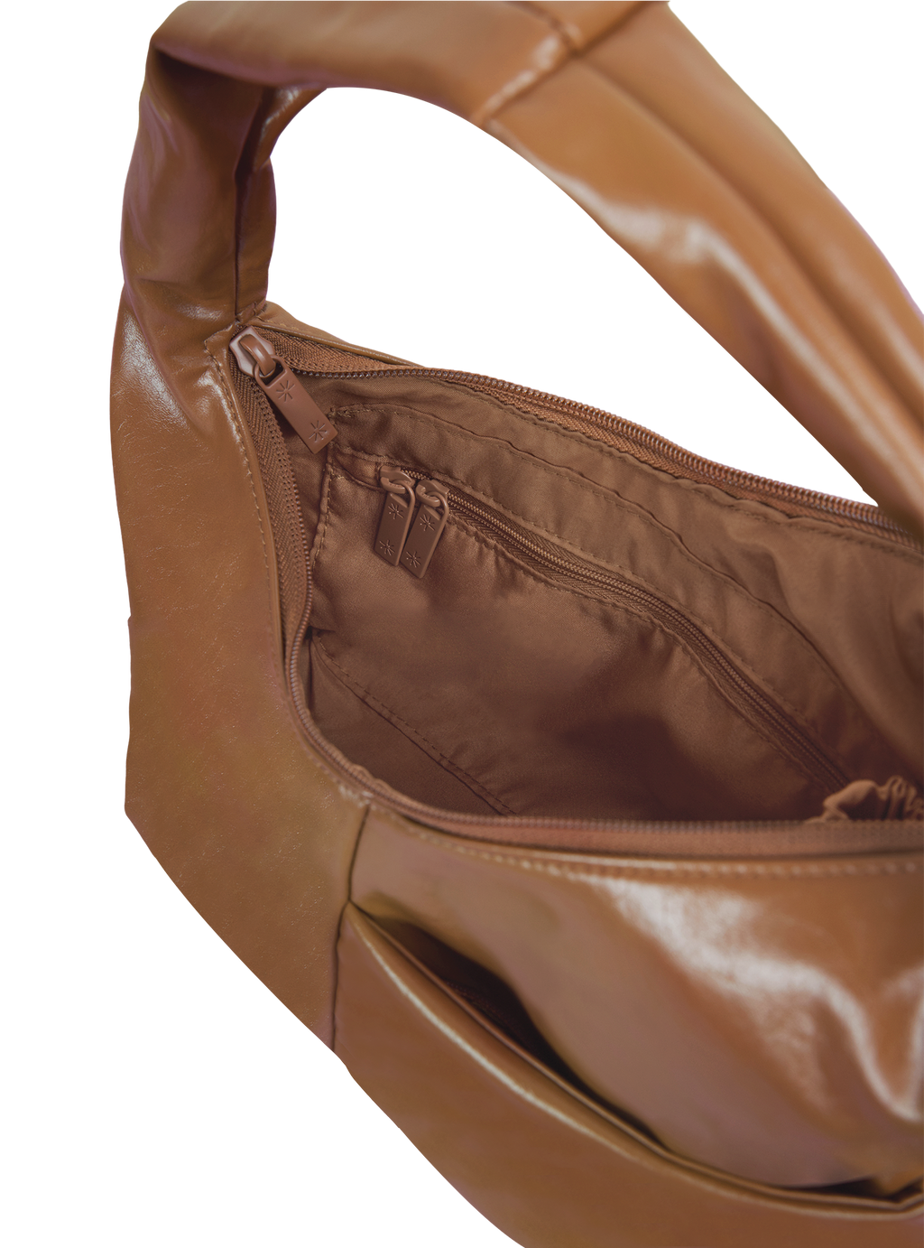 Interior of the Mini Arc hobo-style shoulder bag in warm brown vegan leather, with zipped interior pocket