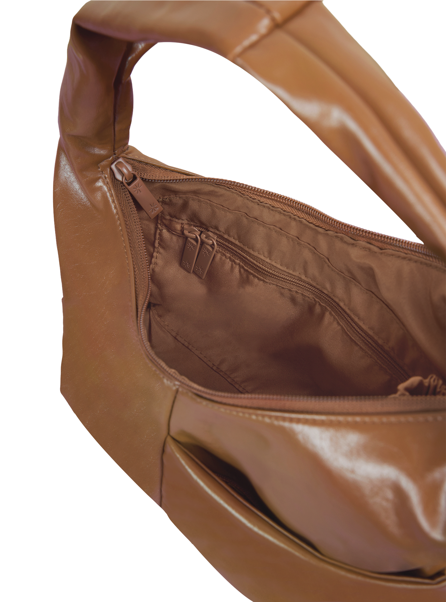 Interior of the Mini Arc hobo-style shoulder bag in warm brown vegan leather, with zipped interior pocket