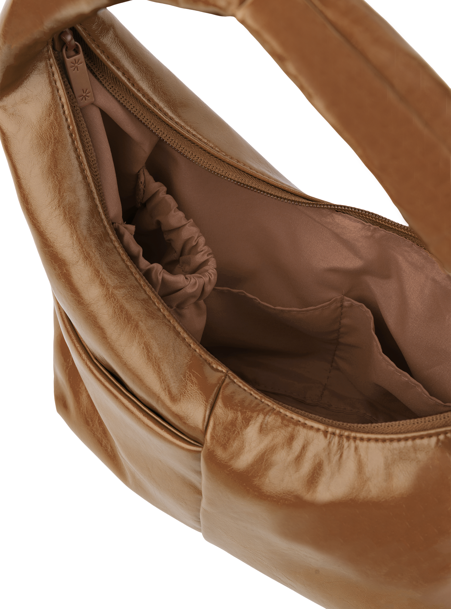 Interior of the Mini Arc hobo-style shoulder bag in warm brown vegan leather, with multiple pockets and a bottle holder