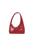 The Mini Arc slouchy hobo-style shoulder bag in red vegan leather with exterior pockets