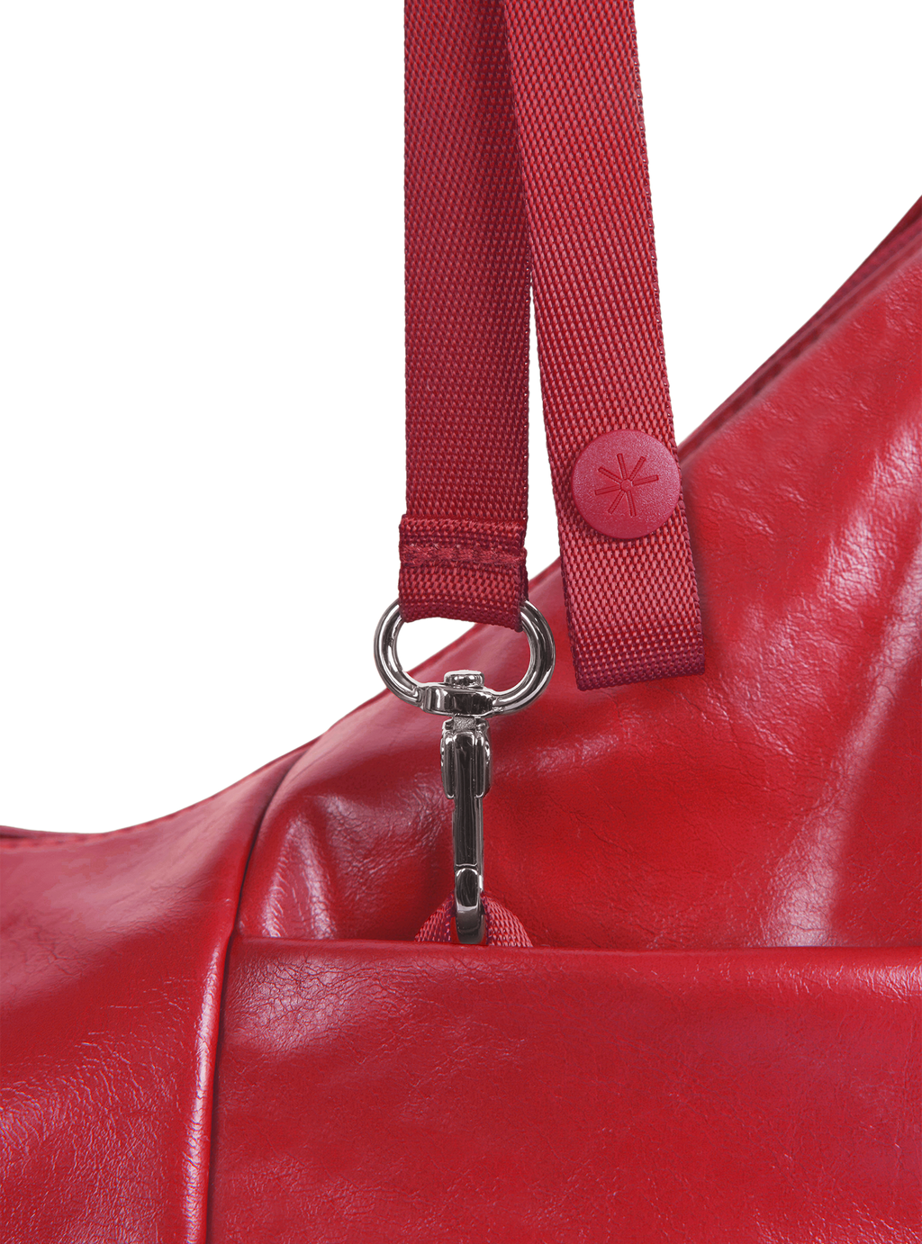 Exterior pocket of the Mini Arc hobo-style shoulder bag in red vegan leather, with concealed snap loop