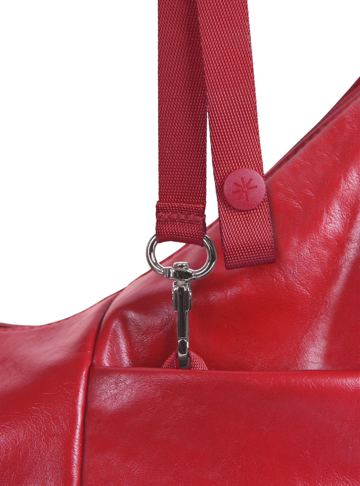 Exterior pocket of the Mini Arc hobo-style shoulder bag in red vegan leather, with concealed snap loop