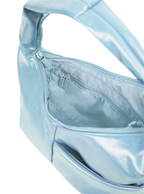 Interior of the Mini Arc hobo-style shoulder bag in pale blue vegan leather, with zipped interior pocket