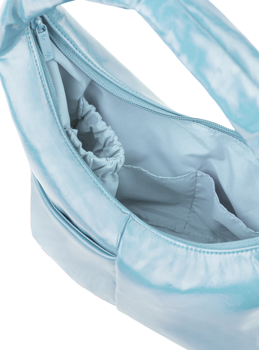 Interior of the Mini Arc hobo-style shoulder bag in pale blue vegan leather, with multiple pockets and a bottle holder