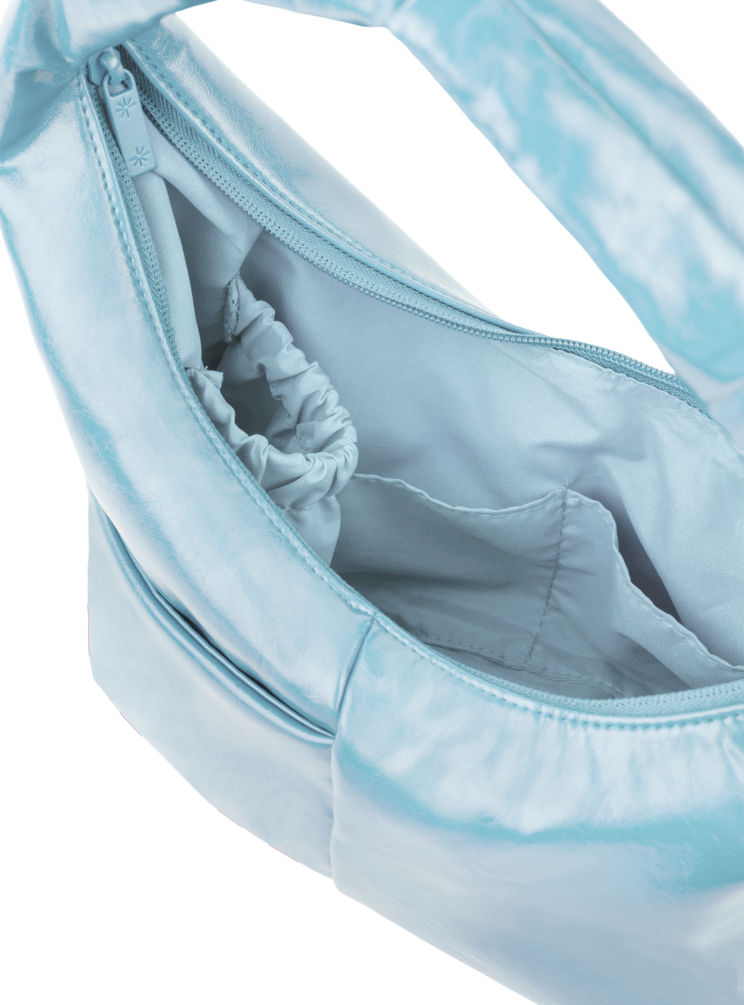 Interior of the Mini Arc hobo-style shoulder bag in pale blue vegan leather, with multiple pockets and a bottle holder