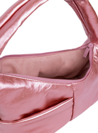 Interior of the Mini Arc hobo-style shoulder bag in metallic pink vegan leather, with multiple pockets