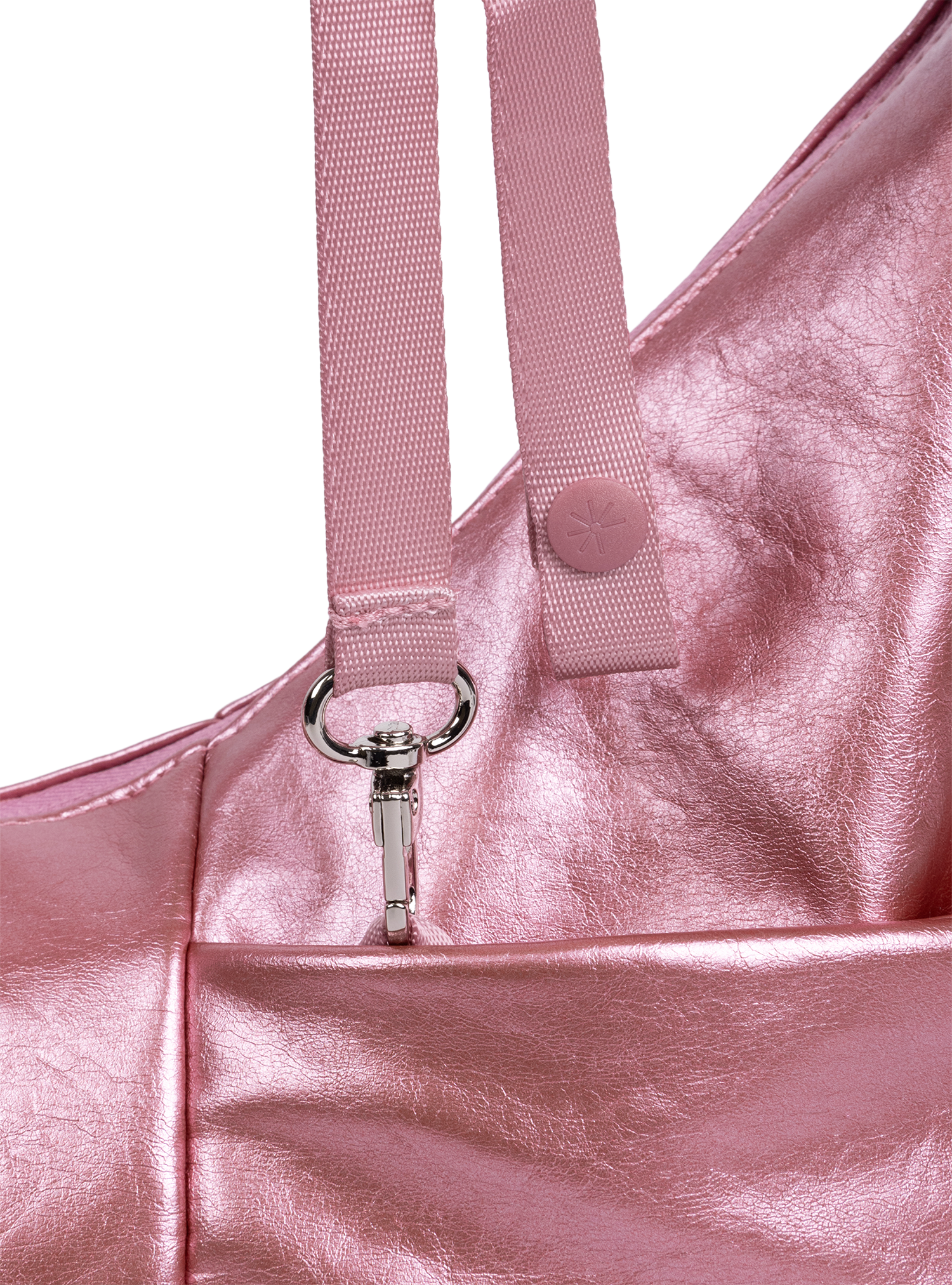 Exterior pocket of the Mini Arc hobo-style shoulder bag in metallic pink vegan leather, with concealed snap loop